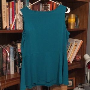 Sleeveless top with peplum skirt